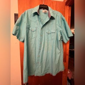 Wrangler blue with red trimming with nice snaps